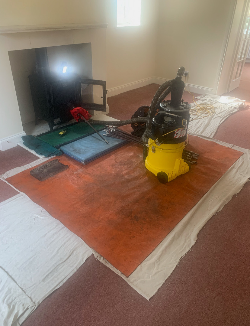 Sweeping unlined stove in Hexham